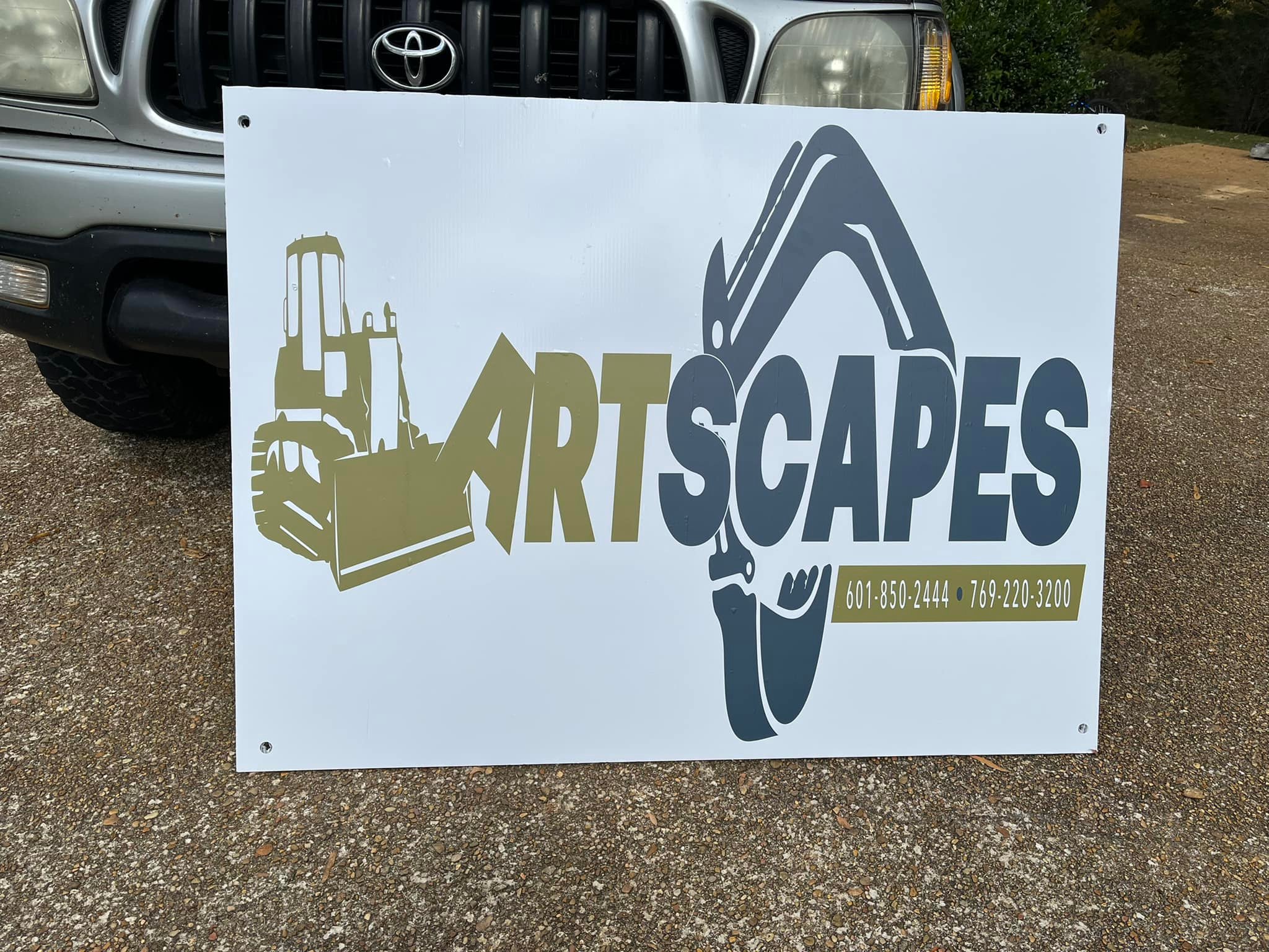 Custom commercial signage featuring bold lettering for retail storefronts